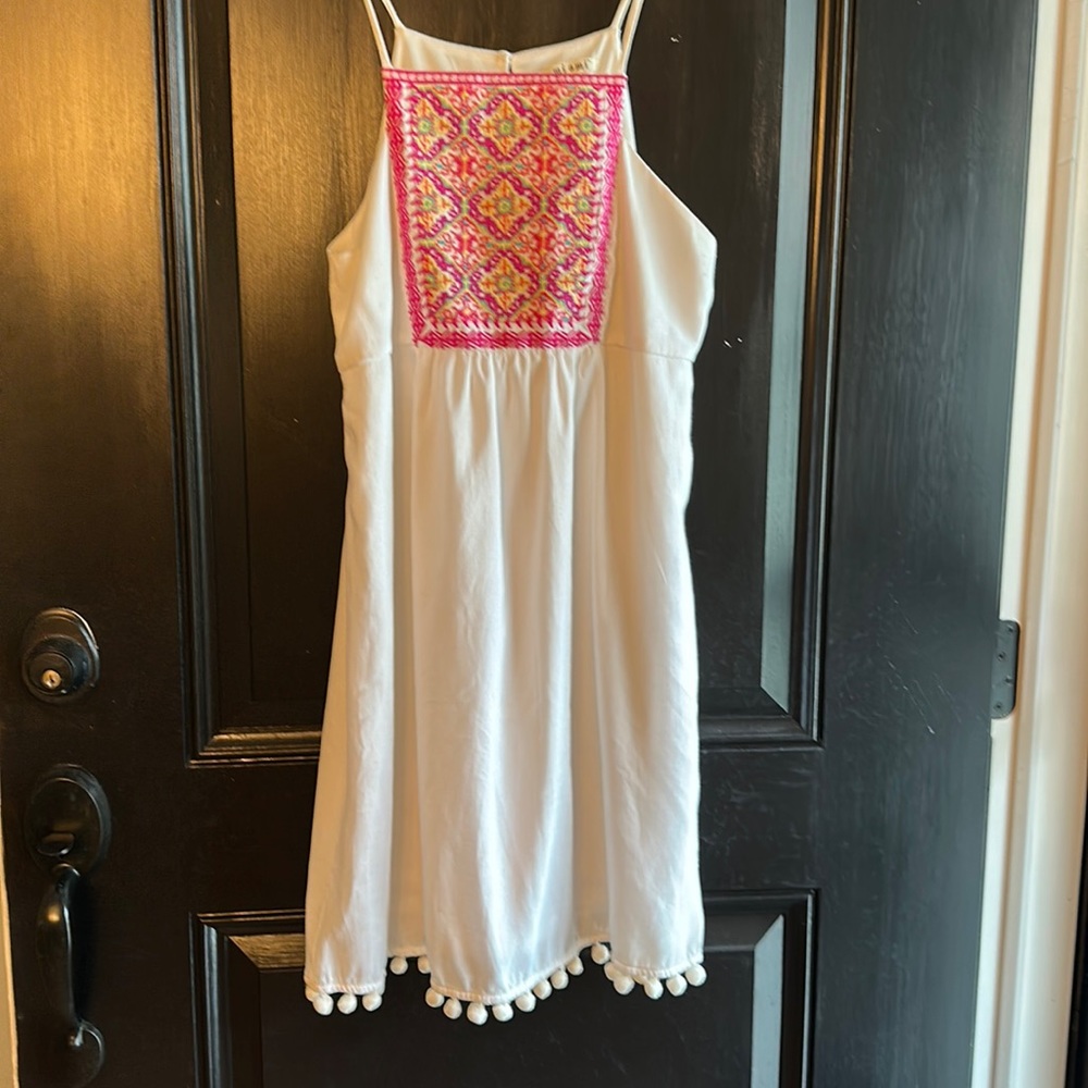Precious white, lined sundress with pink work on chest and pompon hem